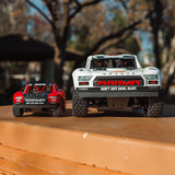 ARRMA - Mojave Grom Mega 380 Brushed 4X4 Small Scale Desert Truck RTR with Battery & Charger, Red/Black (ARA2104T1)